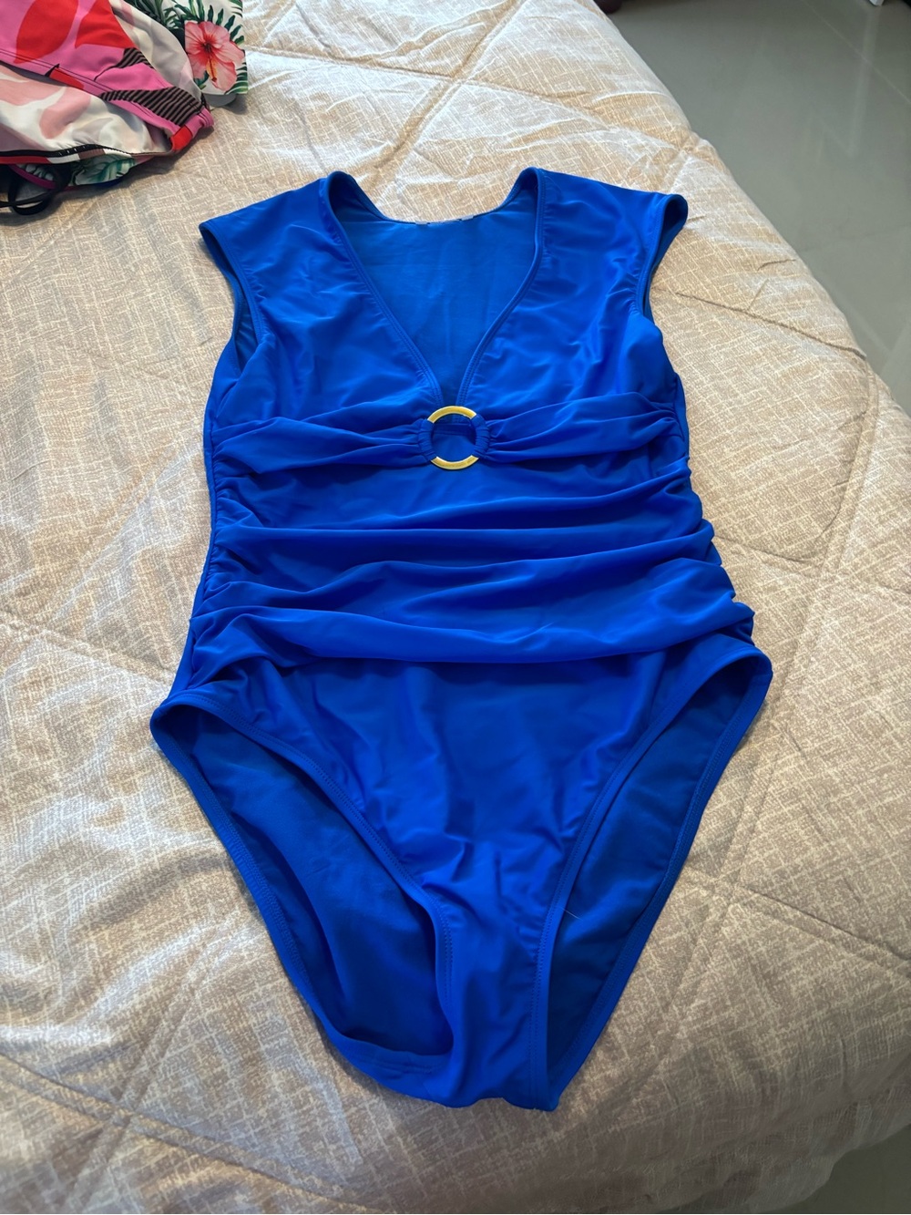 NWOT Royal Blue cut tag designer Swimsuit with extended shoulder cap design
